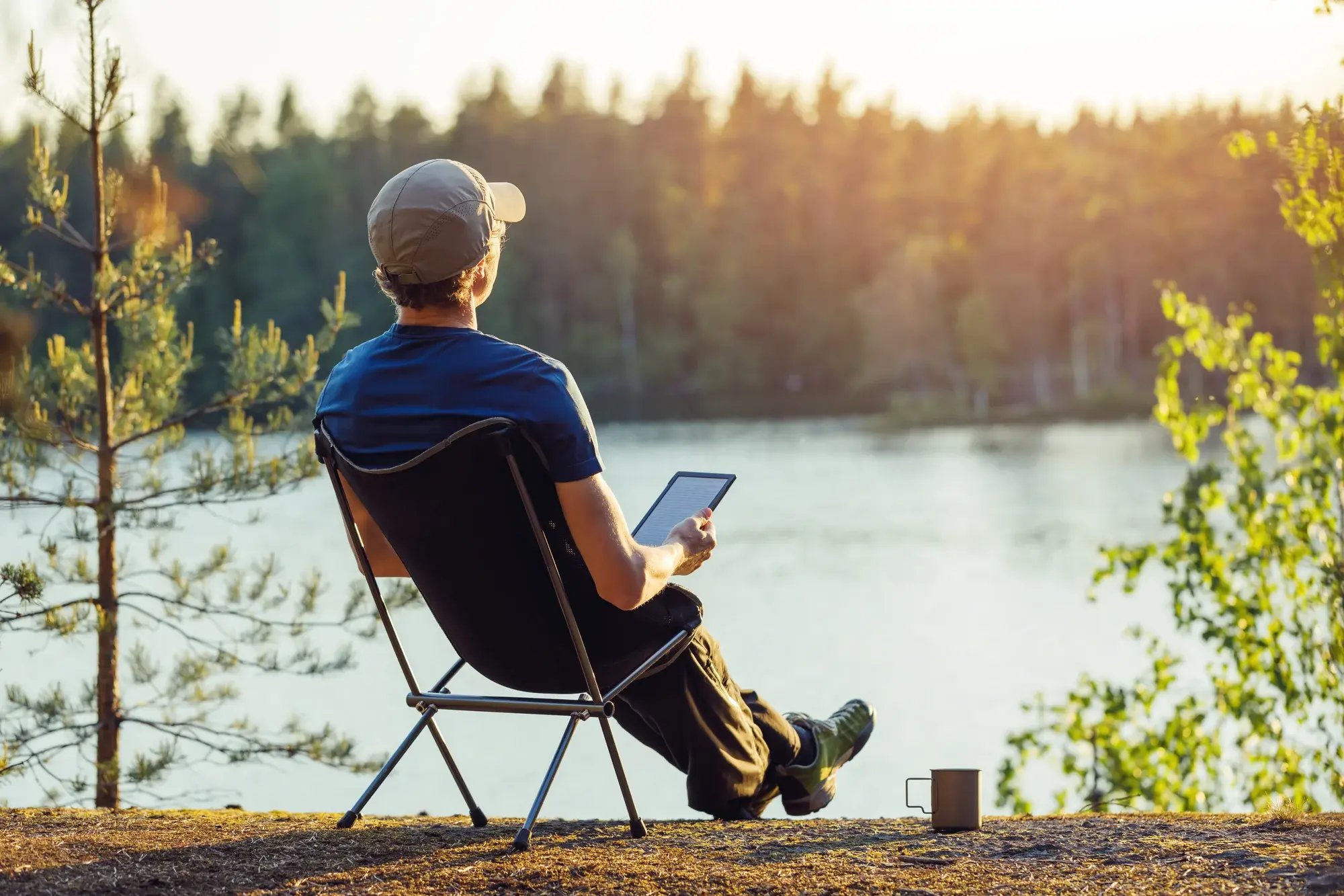 reading blogs by the lake